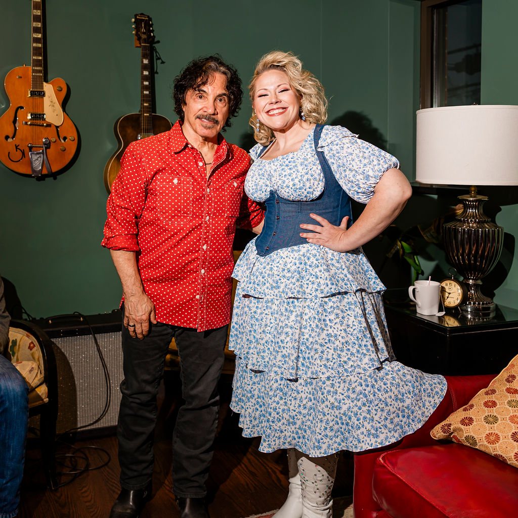 Portrait of two musicians backstage in a green room