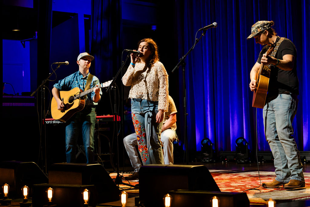 Duo performing on stage at Franklin Theatre